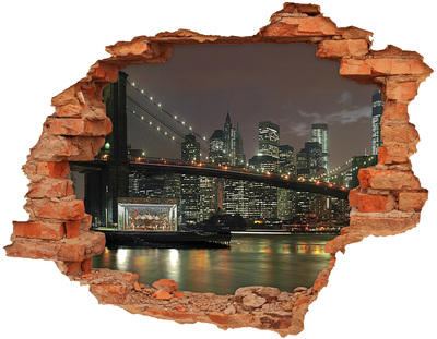 Adesivo effetto buco nel muro New York di notte vista attraverso un buco nel muro