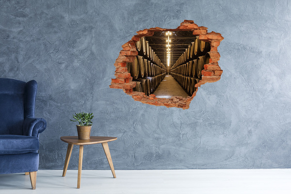 Adesivo effetto buco nel muro Interno di una cantina con botti