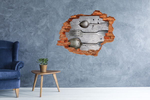 Adesivo con buco sbrecciato Un muro in rovina con vista sulle posate
