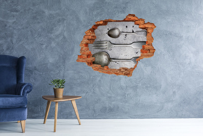 Adesivo con buco sbrecciato Un muro in rovina con vista sulle posate