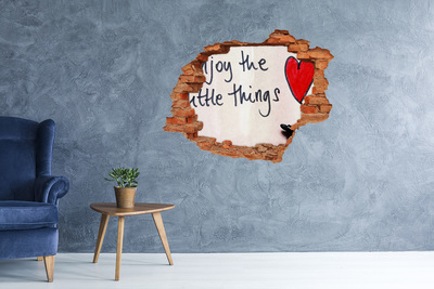 Adesivo effetto buco nel muro Un muro danneggiato con un'iscrizione