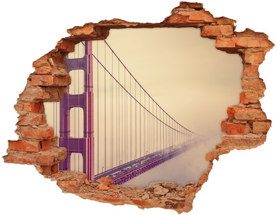 Adesivo effetto buco nel muro Il Golden Gate Bridge tra le nuvole