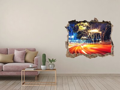 Sticker buco nel muro Una città in movimento di notte