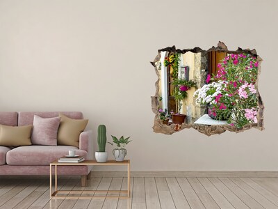 Sticker buco nel muro Un angolo fiorito in città