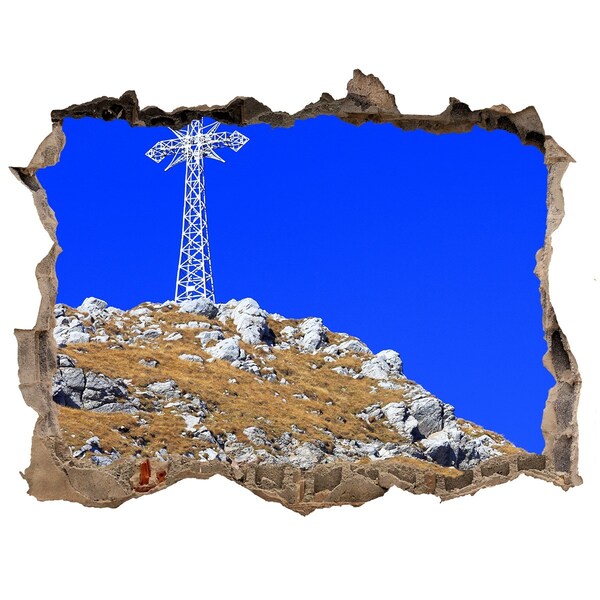 Adesivo buco nel muro Paesaggio montano visto attraverso un buco nel muro