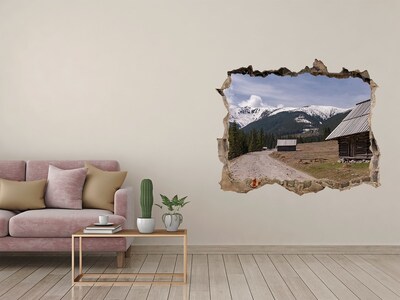 Sticker buco nel muro Paesaggio montano con capanne