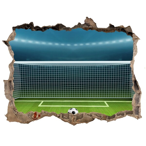Sticker buco nel muro Lo stadio di calcio dietro il buco nel muro