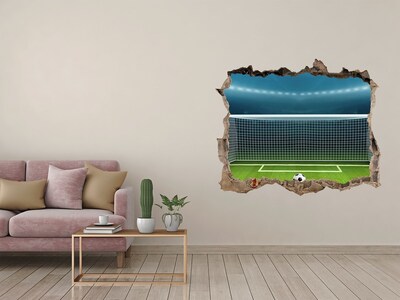 Sticker buco nel muro Lo stadio di calcio dietro il buco nel muro