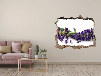 Sticker buco nel muro Un fiore di lavanda spunta dal buco nel muro