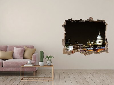 Adesivo buco nel muro Vista notturna di Londra attraverso un buco nel muro
