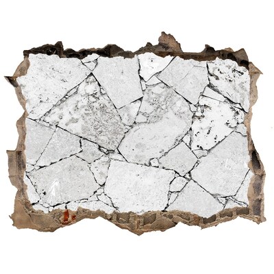 Adesivo buco nel muro Un muro danneggiato con crepe