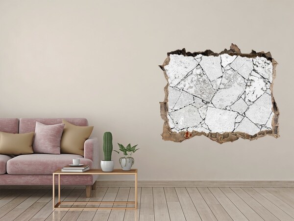 Adesivo buco nel muro Un muro danneggiato con crepe