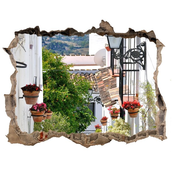 Adesivo buco nel muro Una strada affascinante in un villaggio bianco