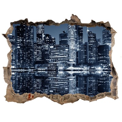 Sticker buco nel muro Città di notte in riva al fiume