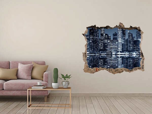 Sticker buco nel muro Città di notte in riva al fiume