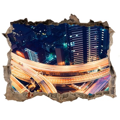 Adesivo buco nel muro Veduta notturna della città
