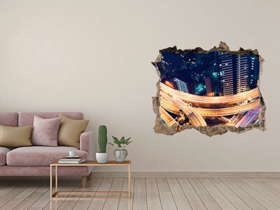 Adesivo buco nel muro Veduta notturna della città