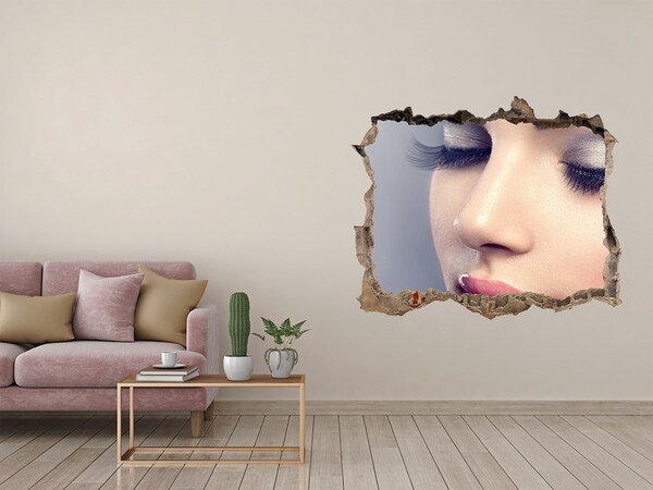 Adesivo buco nel muro Un volto sensuale in un muro in rovina