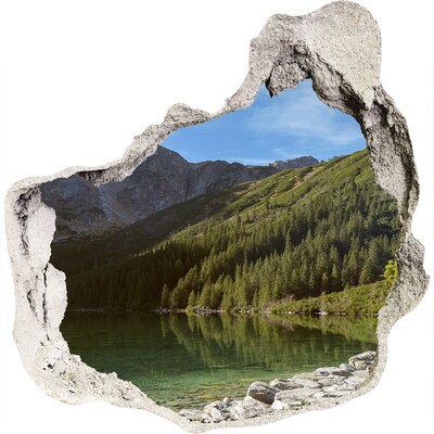 Trompe l'oeil buco nel muro Lago di montagna nella valle