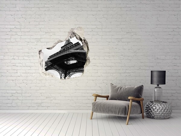 Adesivo effetto buco nel muro La Torre Eiffel in un ambiente monocromatico