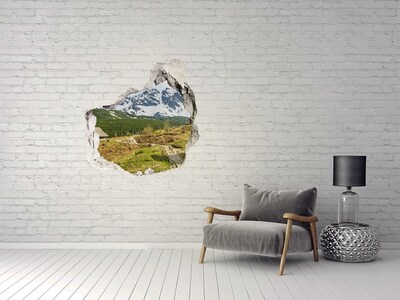 Trompe l'oeil buco nel muro Paesaggio montano con un villaggio