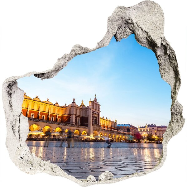 Trompe l'oeil buco nel muro Cracovia al tramonto