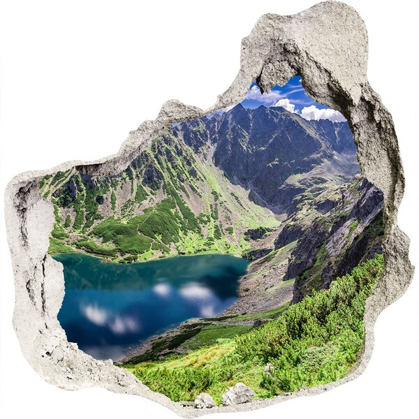 Trompe l'oeil buco nel muro Valle di montagna con lago