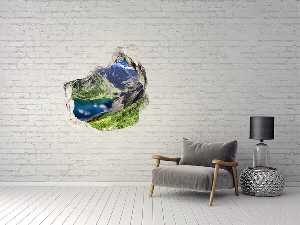 Trompe l'oeil buco nel muro Valle di montagna con lago