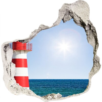 Adesivo effetto buco nel muro Un faro in riva al mare
