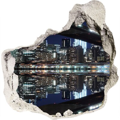 Adesivo effetto buco nel muro Panorama notturno della città