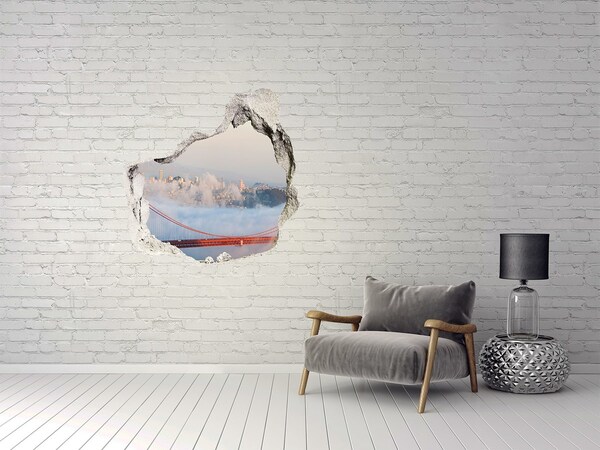 Trompe l'oeil buco nel muro Il Golden Gate Bridge tra le nuvole