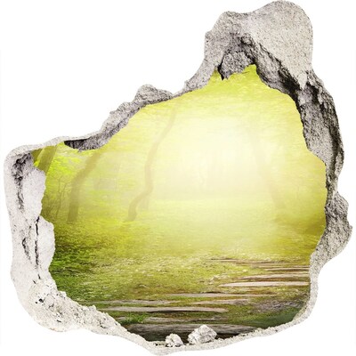Adesivo effetto buco nel muro Foresta verdeggiante ai raggi del sole