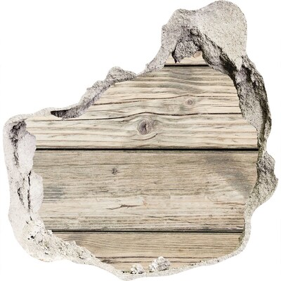 Adesivo effetto buco nel muro Una tavola di legno in un buco nel muro