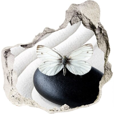 Finto buco nel muro 3D Una farfalla su una pietra in un ambiente zen.