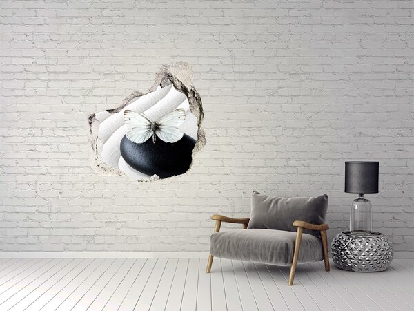 Finto buco nel muro 3D Una farfalla su una pietra in un ambiente zen.