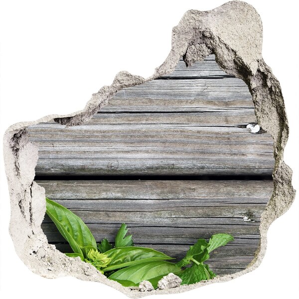 Adesivo effetto buco nel muro Un muro danneggiato con pavimento in legno