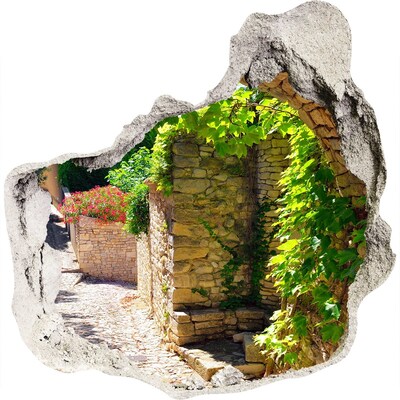 Adesivo effetto buco nel muro Una strada verdeggiante in città