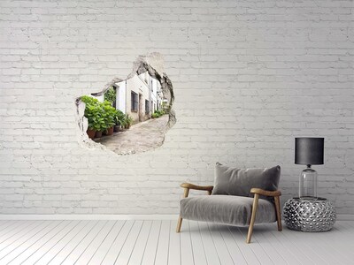 Trompe l'oeil buco nel muro Una strada affascinante con vegetazione