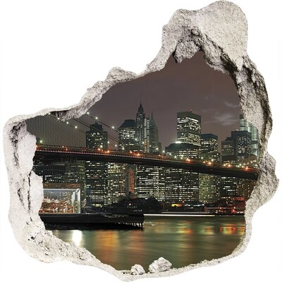 Adesivo effetto buco nel muro New York di notte vista attraverso un buco nel muro
