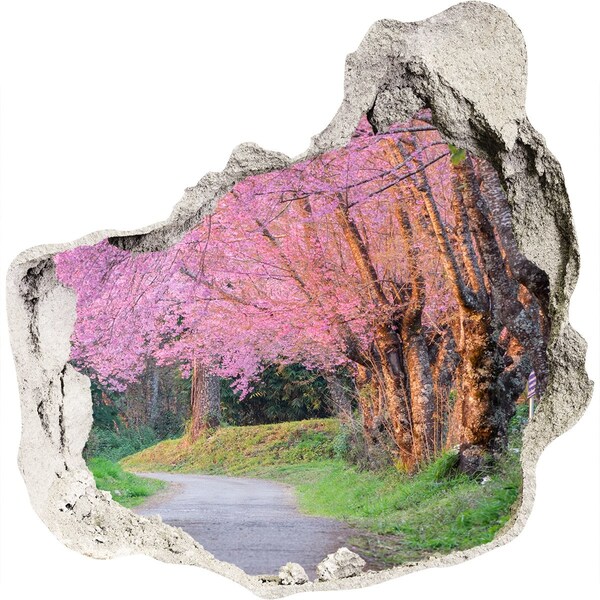 Trompe l'oeil buco nel muro Una passeggiata primaverile tra gli alberi in fiore