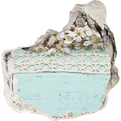 Trompe l'oeil buco nel muro Motivo floreale su sfondo di legno blu