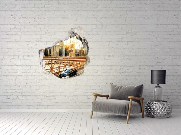 Trompe l'oeil buco nel muro Ponte di Brooklyn al tramonto