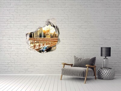 Trompe l'oeil buco nel muro Ponte di Brooklyn al tramonto