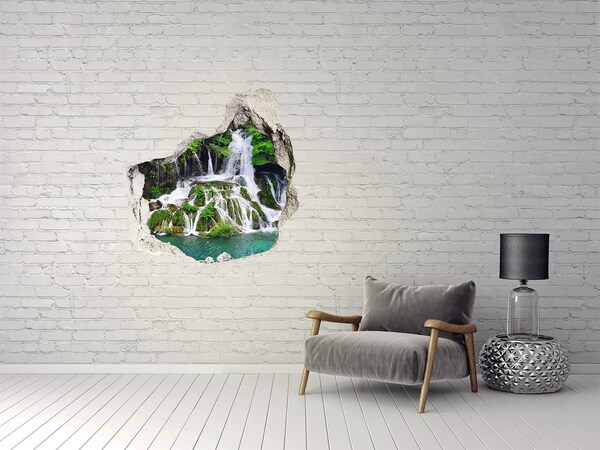 Trompe l'oeil buco nel muro Una cascata immersa nel verde.