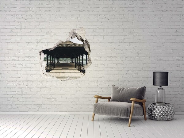 Trompe l'oeil buco nel muro Vista del molo sull'acqua