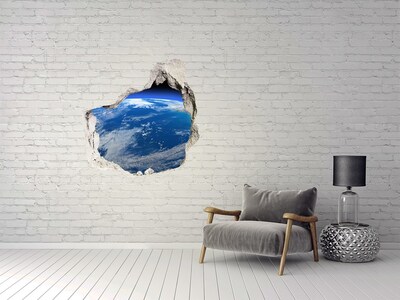 Trompe l'oeil buco nel muro Vista della Terra dallo spazio