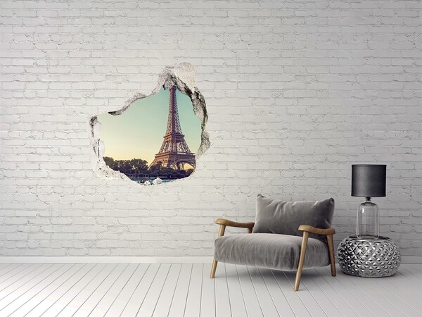 Trompe l'oeil buco nel muro La Torre Eiffel al tramonto