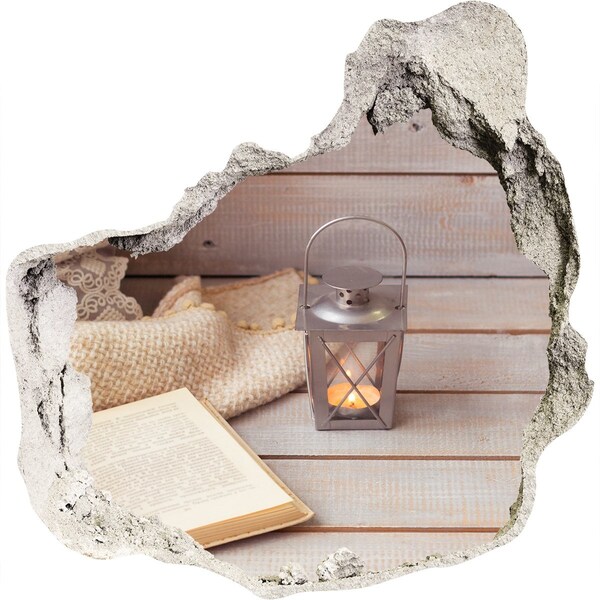 Adesivo effetto buco nel muro Un angolo accogliente con una lanterna