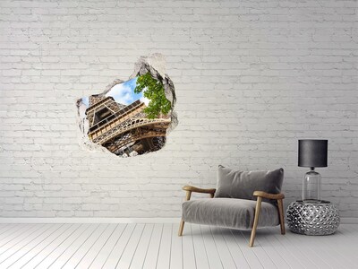 Trompe l'oeil buco nel muro La Torre Eiffel a Parigi