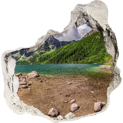 Trompe l'oeil buco nel muro Lago di montagna nella valle